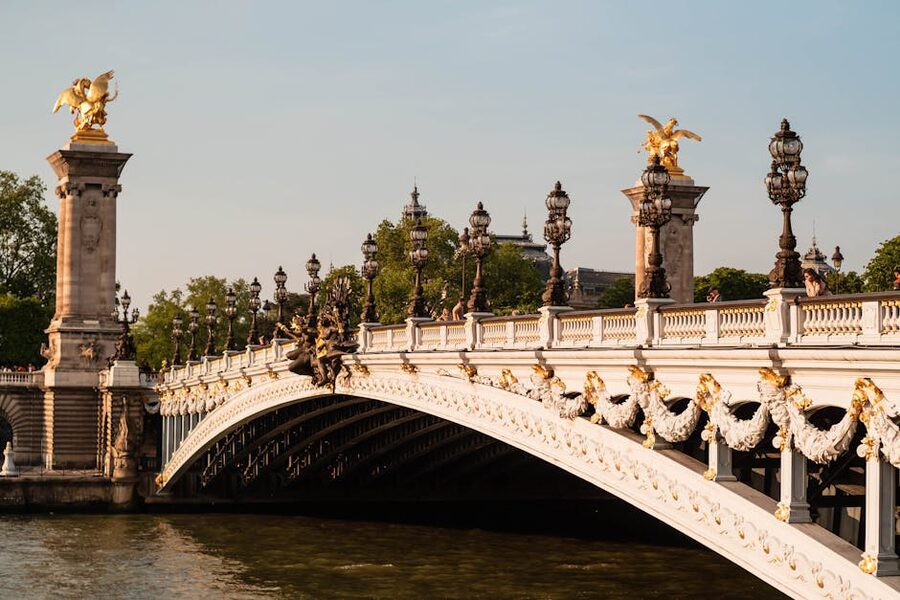 Golden statues on Pont Alexandre III bridge over the Seine in Paris