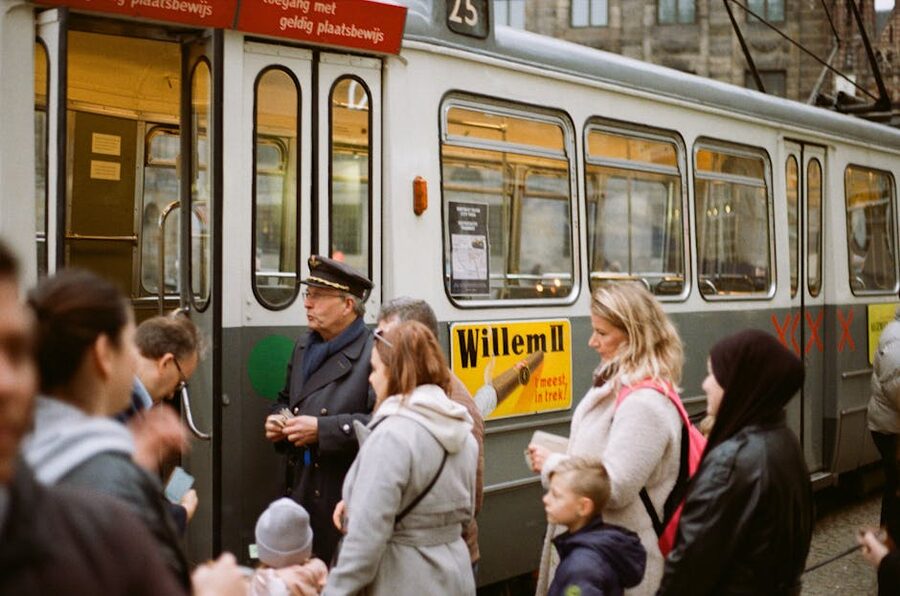 Amsterdam tram passengers waiting to board