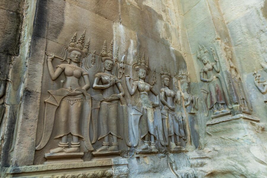 Bas-relief carvings depicting deities at Angkor Wat