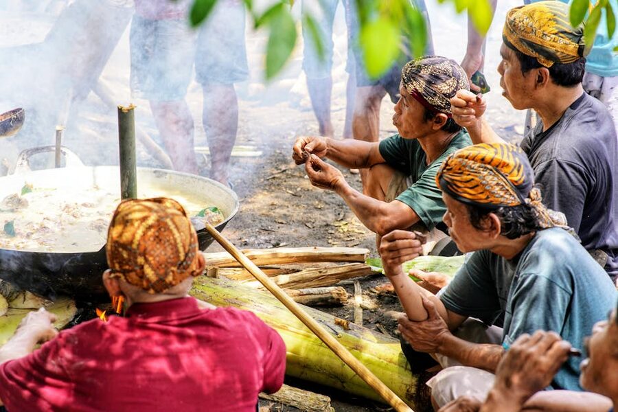 Men cooking in a traditional Indonesian outdoor kitchen