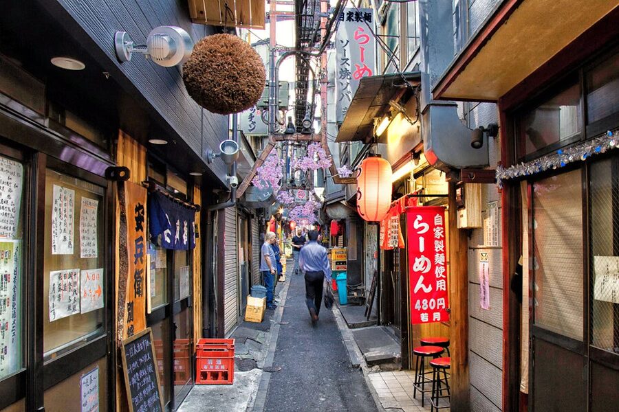 Traditional Japanese restaurants along a narrow Tokyo backstreet