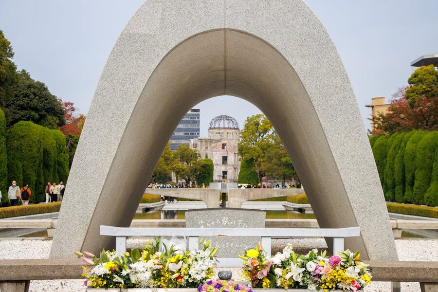 View of Hiroshima Memorial and Atomic Bomb Dome through an arch in Peace Park