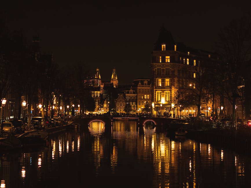 Amsterdam illuminated canal houses at night