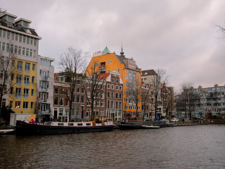 Amsterdam canal in winter with boats moored