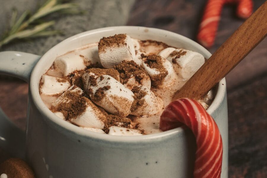 Cup of hot chocolate with marshmallows and cinnamon