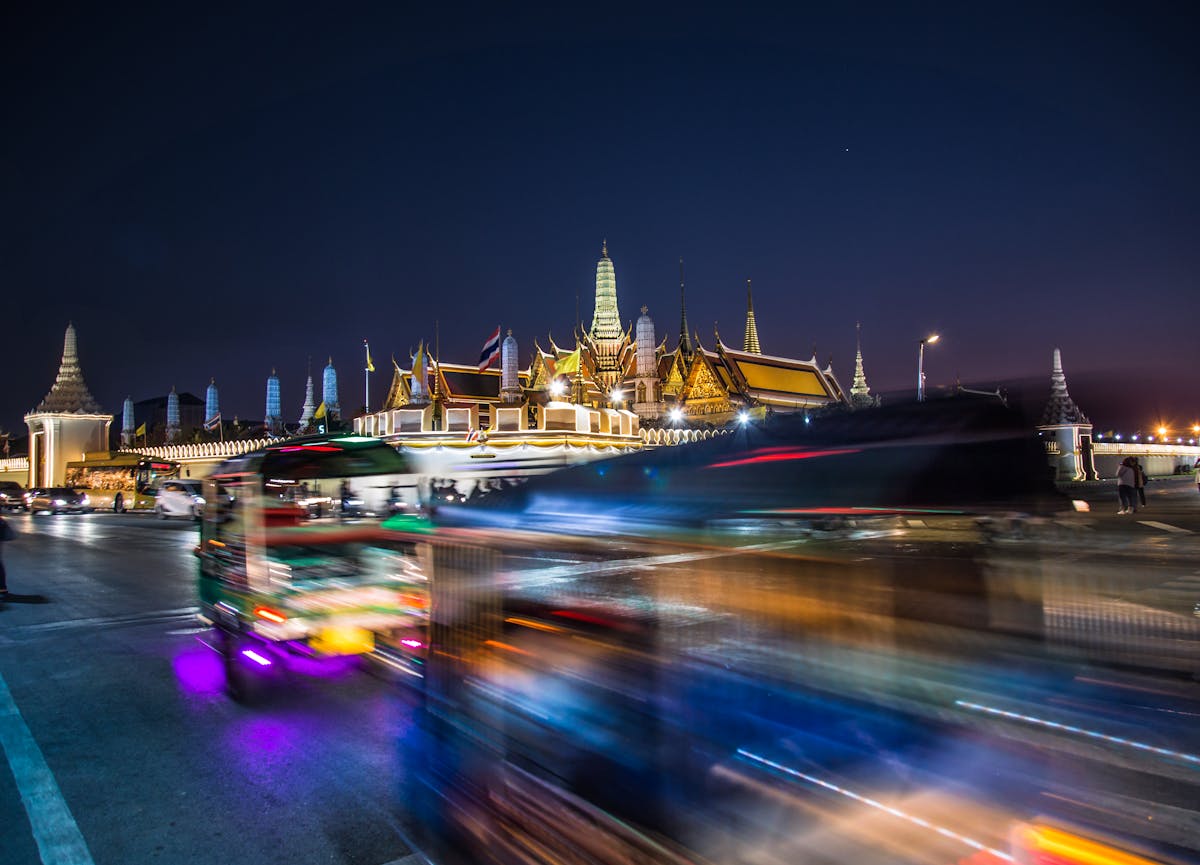 Bangkok cityscape with Wat Phra Kaew illuminated at night