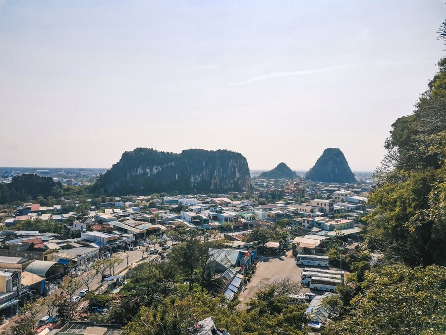 Aerial view of the Marble Mountains rising from the flat landscape of Da Nang, Vietnam