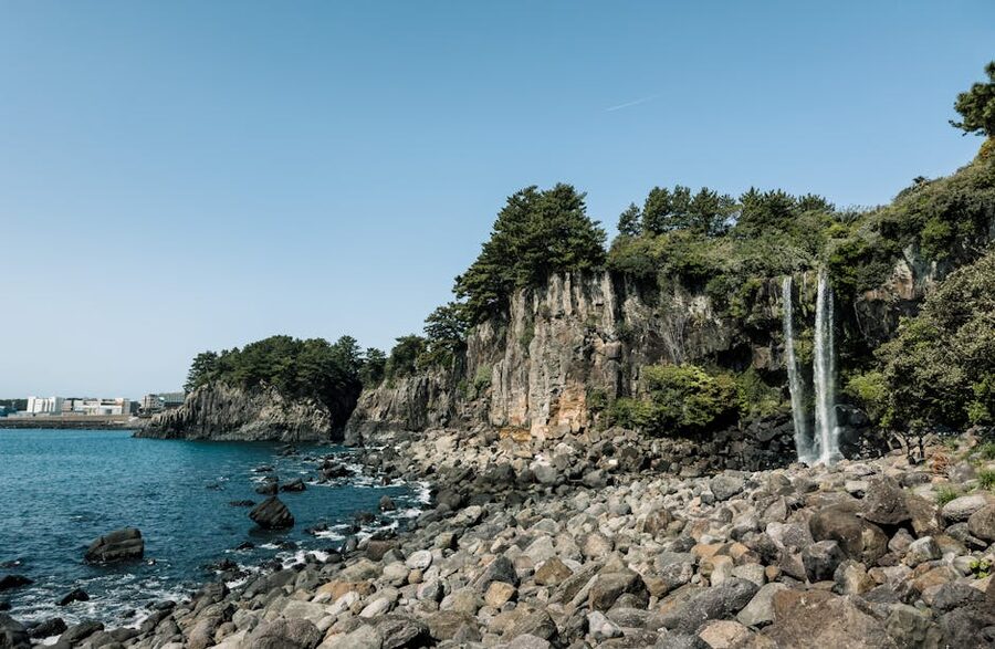 Jeongbang Waterfall on Jeju Island emptying into the sea