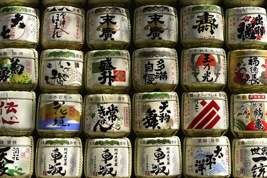 Decorative sake barrels stacked at Meiji Jingu Shinto shrine in Tokyo