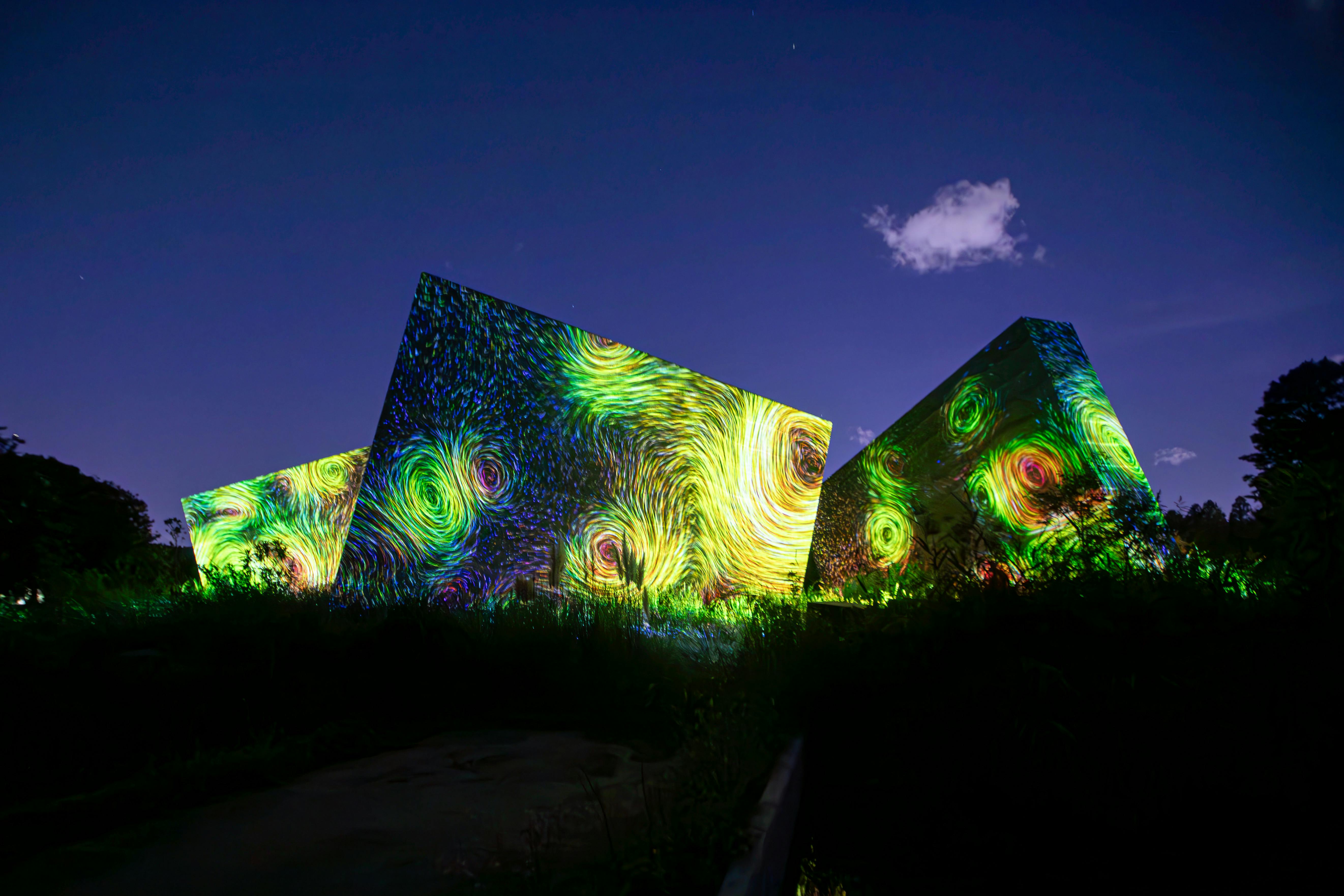 Dynamic light projections on modern architecture in Osaka at night