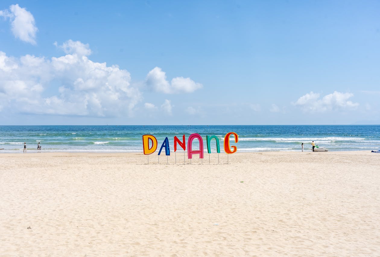 Sunny day at Da Nang beach with clear skies and calm sea