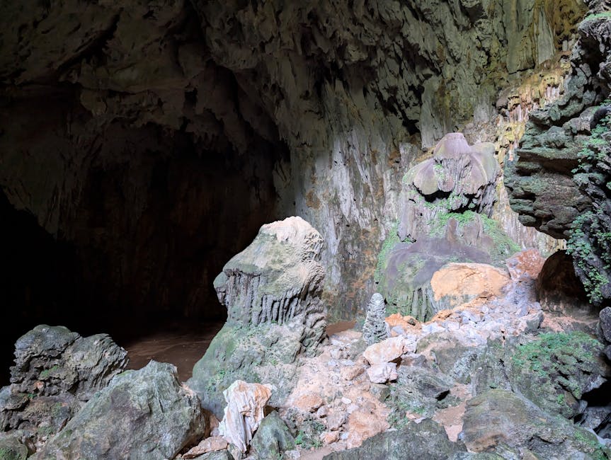 Inside Manjanggul Lava Tube showing ancient volcanic rock formations