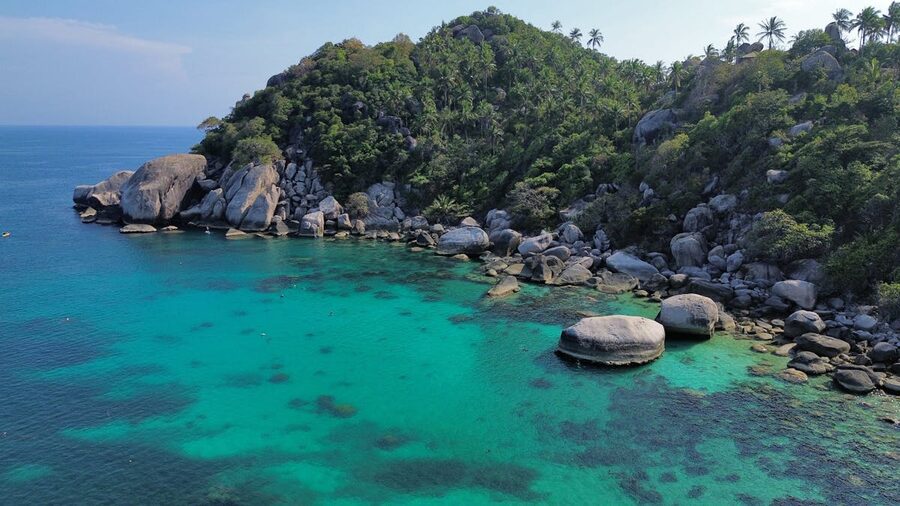 Aerial view of tropical Shark Bay with turquoise waters at Koh Tao