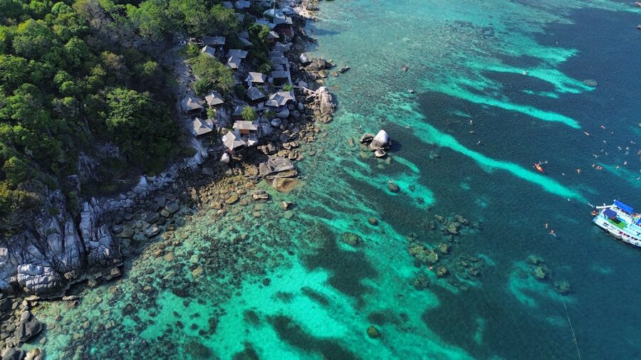 Rocky coastline of Koh Tao with clear turquoise water