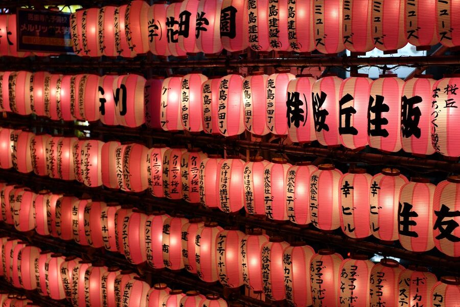 Brightly illuminated paper lanterns showcasing Japanese culture in Tokyo at night
