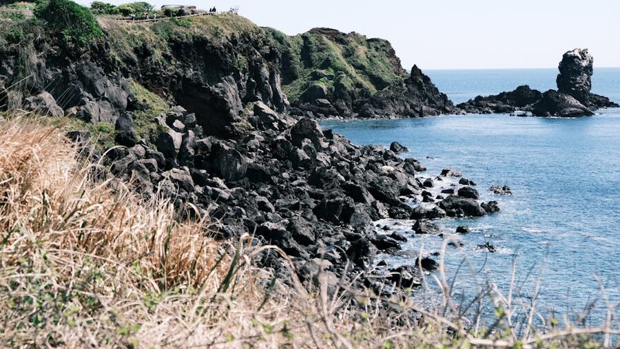Jeju Island cliff coastline and volcanic landscape