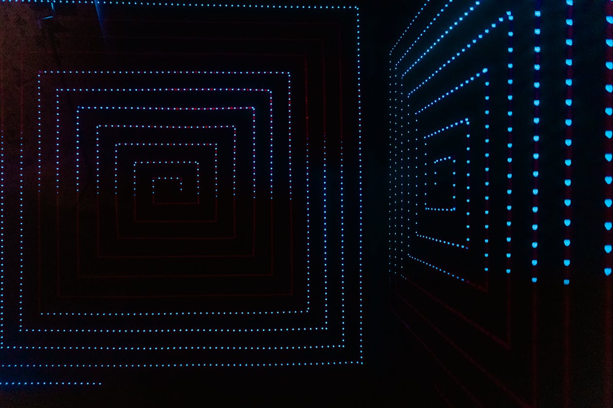 Abstract LED light pattern creating a geometrical illusion in a dark room
