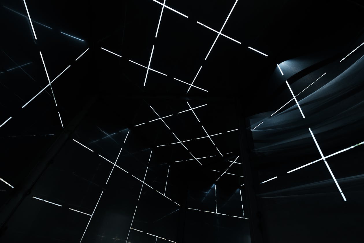 Futuristic abstract light installation showing dynamic geometric patterns