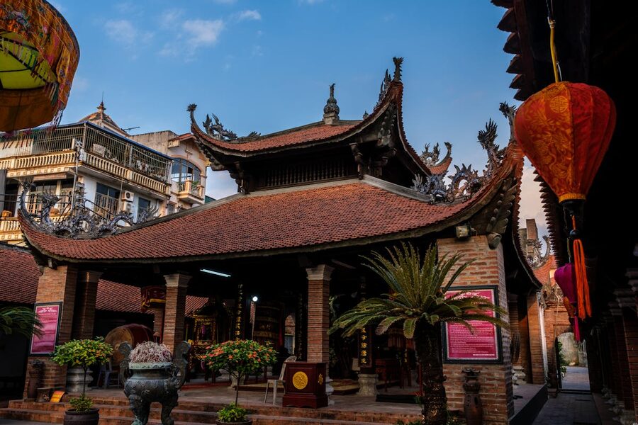 Traditional Vietnamese temple with ornate roof details and architecture in Hanoi