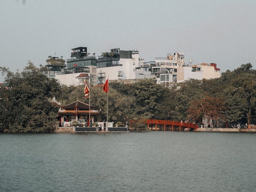 The iconic red Huc Bridge leading to Ngoc Son Temple on Hoan Kiem Lake in Hanoi