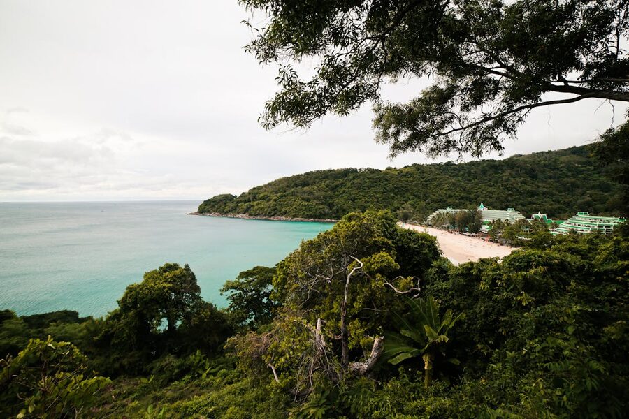Tropical coastline with lush hills and forest in Phuket