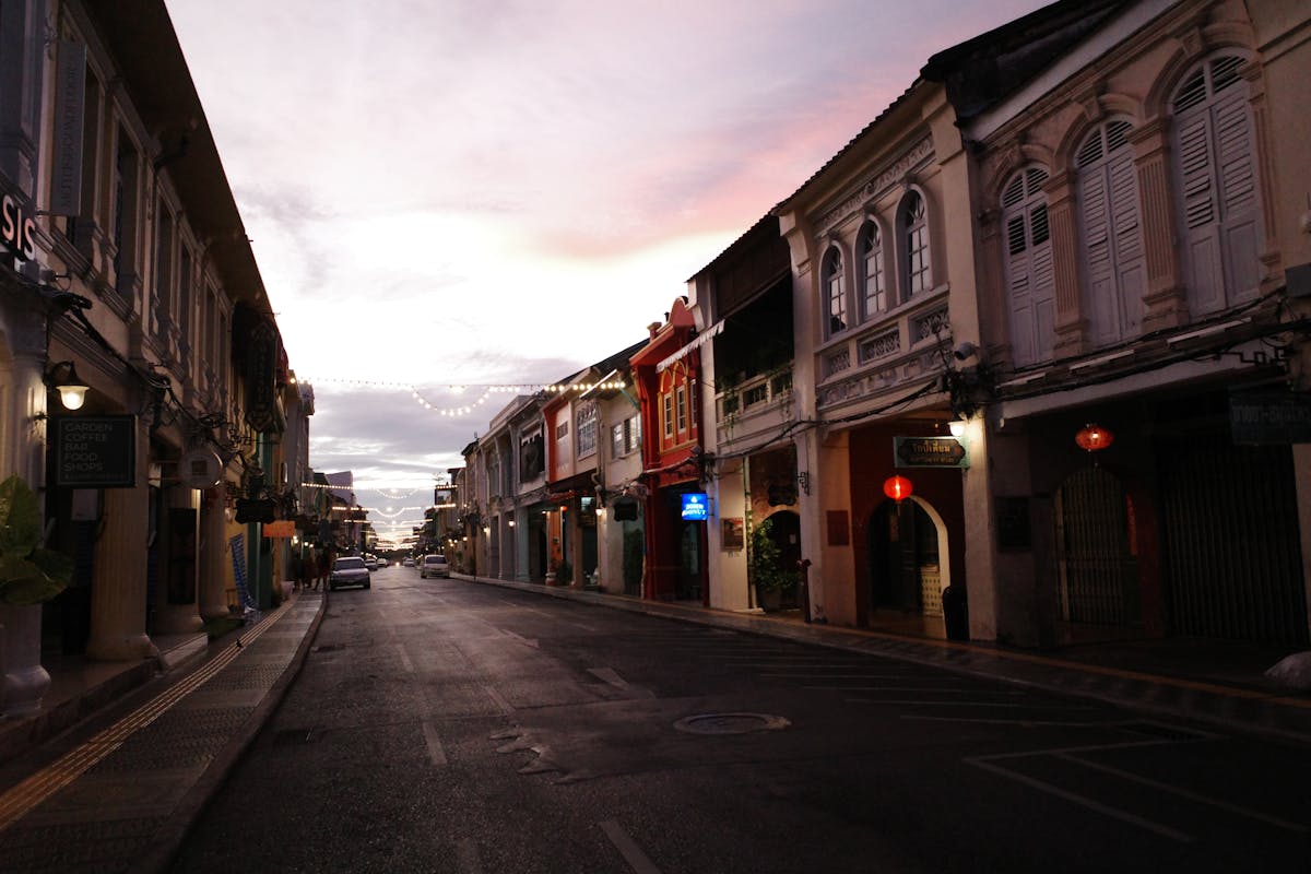 Sino-Portuguese shophouses along a quiet street in Phuket Old Town at dusk
