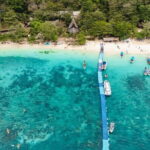 Phuket: Coral, Racha, Promthep Island Catamaran Day Trip - Coral Island: Sun, Sand, and Water Sports