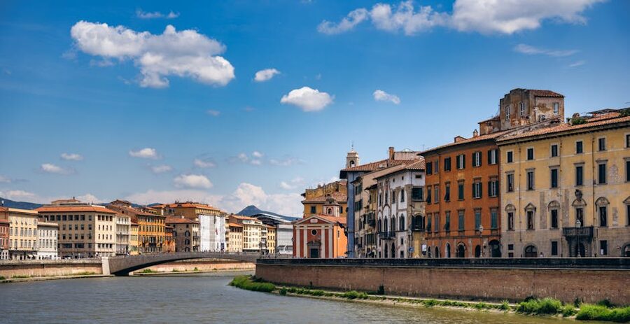 Pisa Arno riverside with historic colorful buildings
