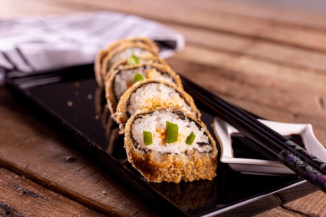 Plate of assorted sushi rolls including maki and nigiri