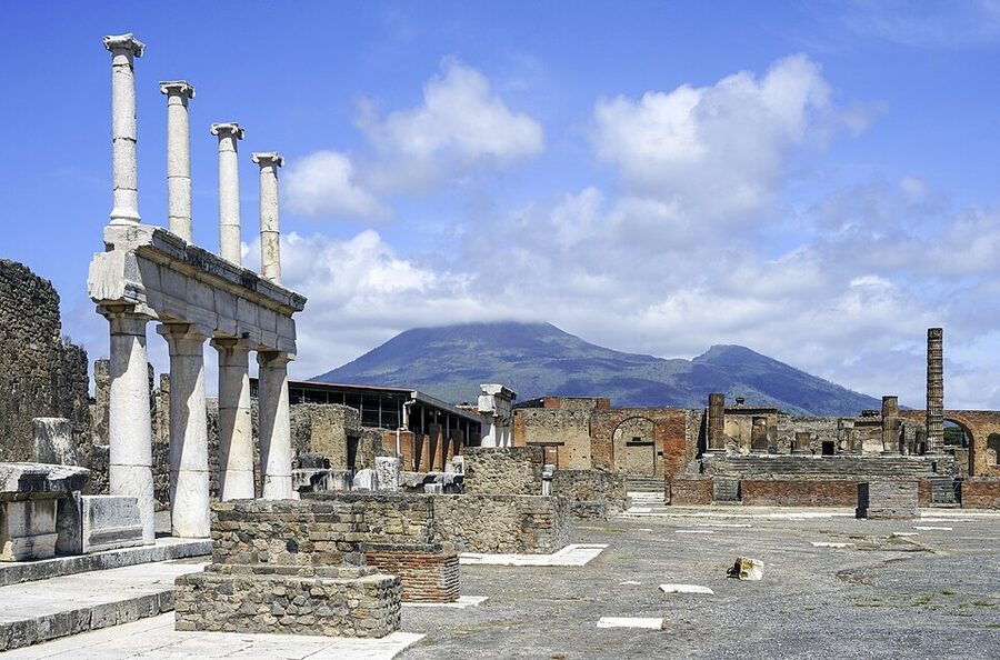Pompeii Forum public square with Mount Vesuvius behind columns