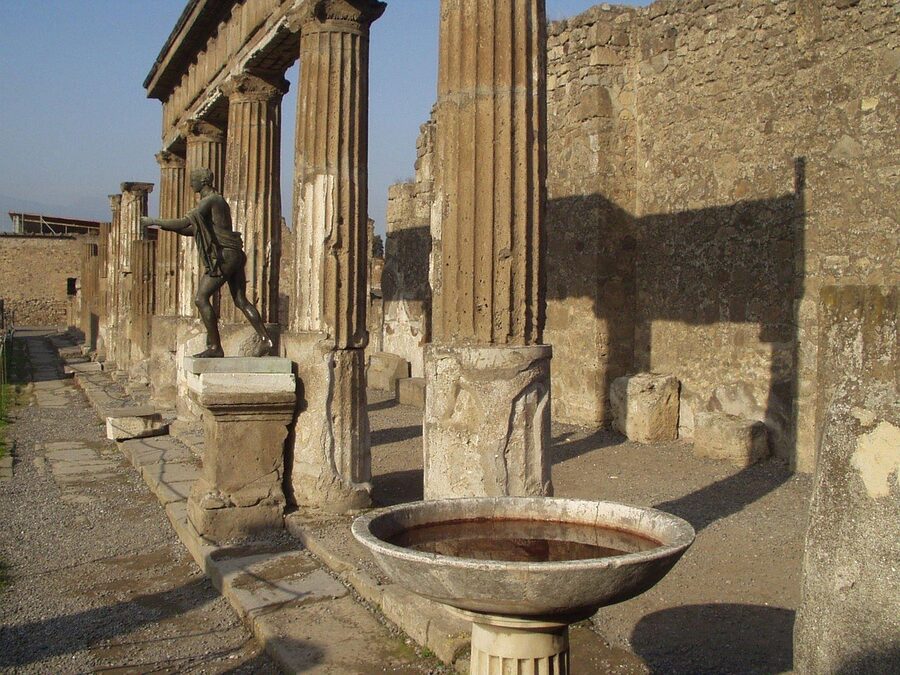 Pompeii House of the Faun pool with columns and statue