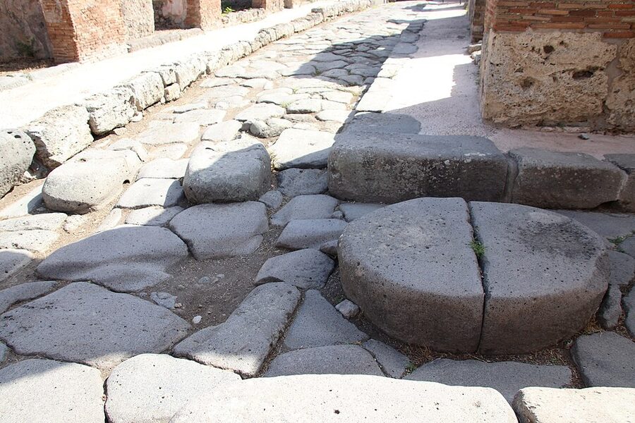 Stepping stones across an ancient Roman street in Pompeii