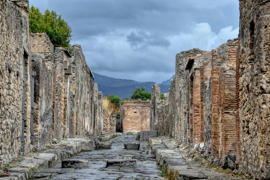 Pompeii ancient streets with distant mountains in Campania