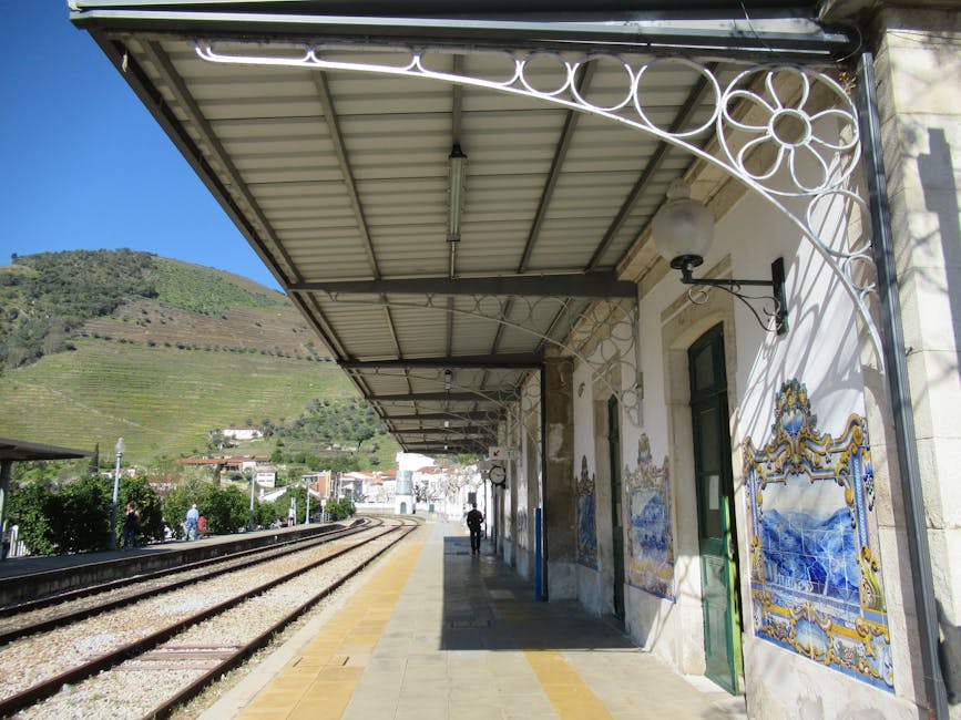 Pinhao train station with azulejos and Douro hills