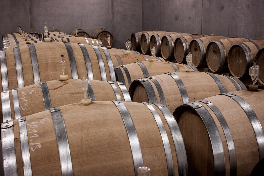 Wine cellar with stacked oak barrels at a Portuguese quinta