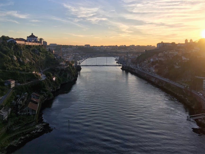 Golden hour over Douro River with Dom Luis I Bridge Porto