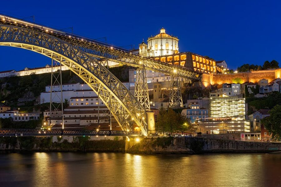 Illuminated Dom Luis I Bridge at night with Serra do Pilar Monastery Porto