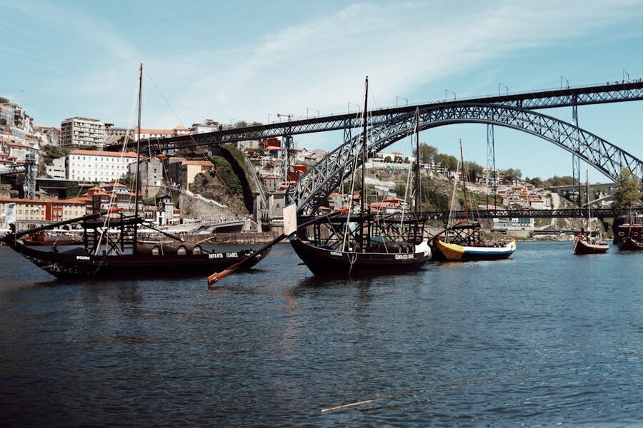 Luis I Bridge with rabelo sailboats on the Douro