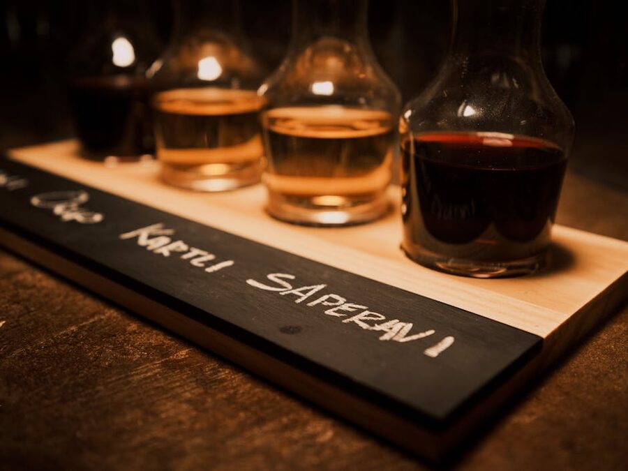Port wine tasting flight on a chalkboard tray