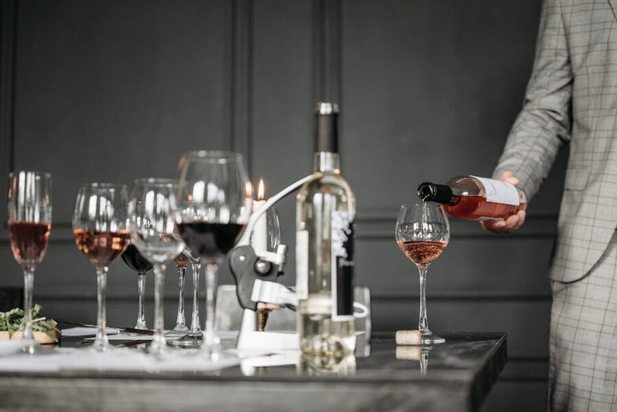 Sommelier pouring port wine for a tasting at Cálem