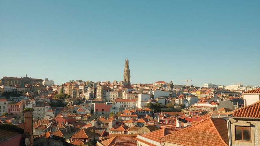 Porto historic district with Clerigos Tower and red rooftops