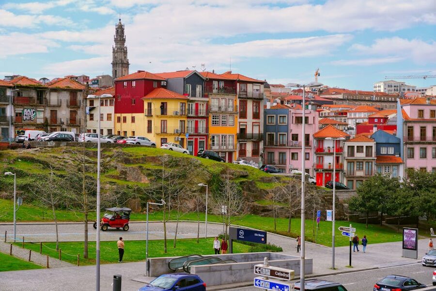Colorful Porto street looking toward Torre dos Clerigos