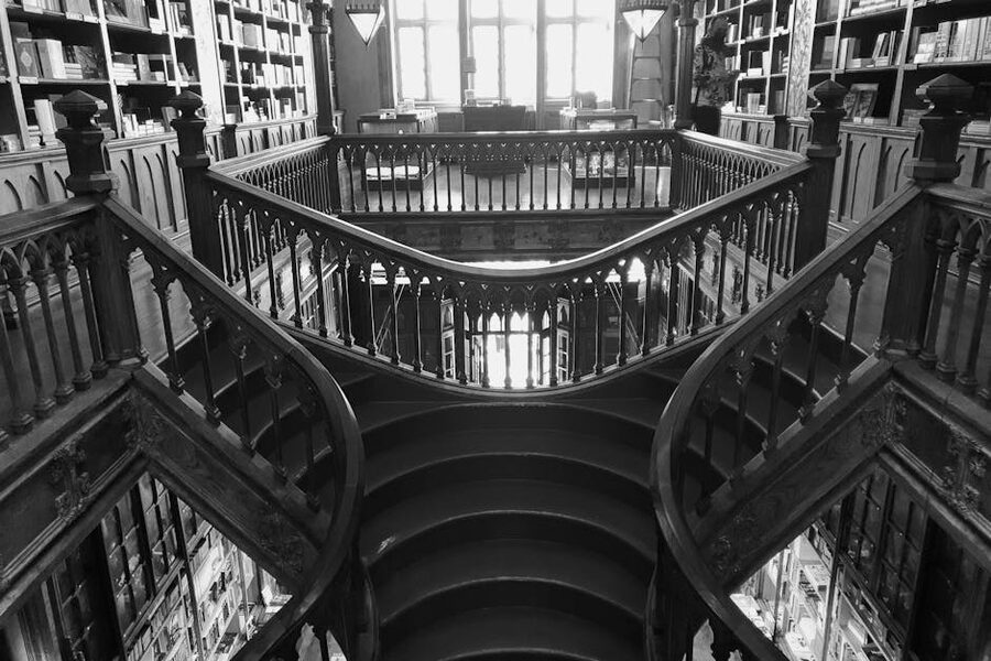 Livraria Lello wooden staircase next to Torre dos Clerigos in Porto