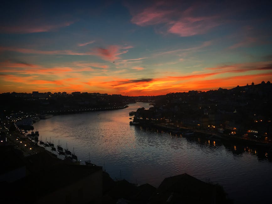 Porto Douro River sunset reflections with cityscape