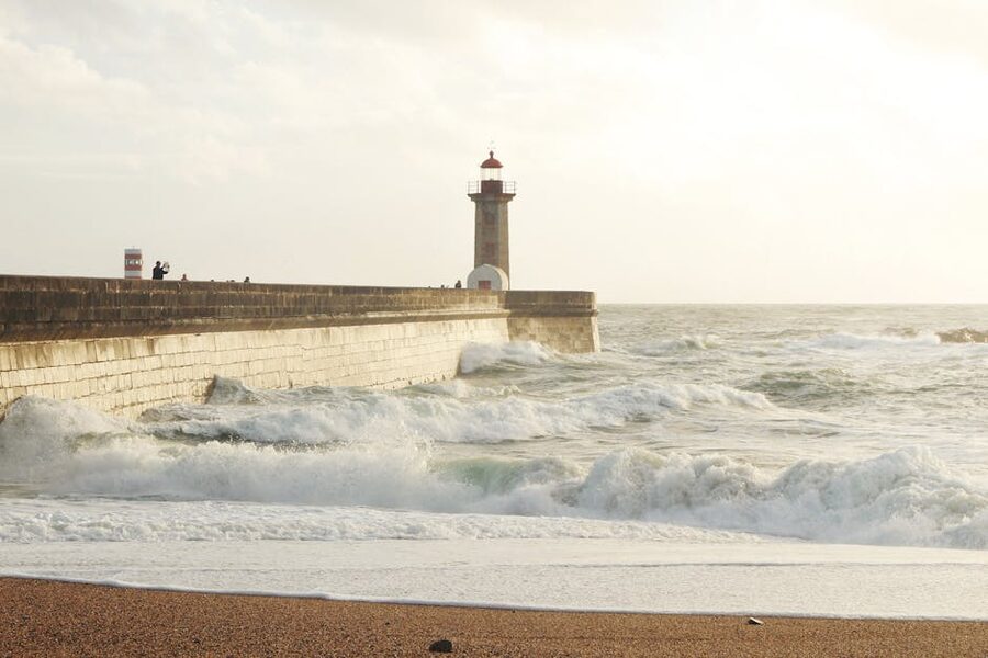 Felgueiras Lighthouse at Foz do Douro with waves crashing