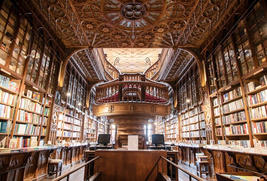 Livraria Lello bookstore interior with ornate wooden staircase