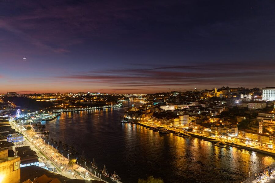 Porto illuminated riverside at night Douro view