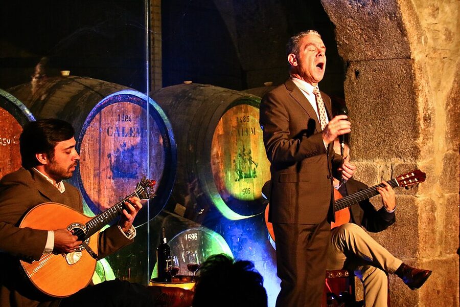 Porto fado scene with singer and guitarist together