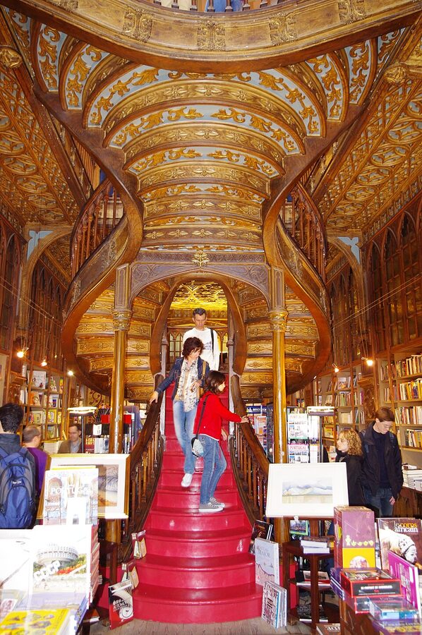 Central red staircase at Livraria Lello bookshop Porto