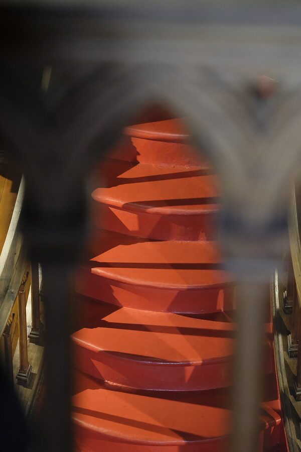 Decus in Labore stained glass detail at Livraria Lello